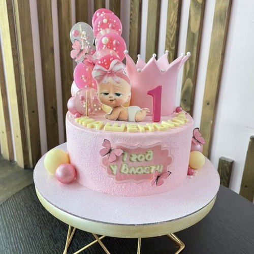 Торт на годик #1296 с картинкой малышки леденцами и короной, розовый